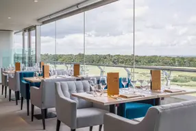 Glass fronted restaurant with a spacious trackside viewing balcony and roof-top terrace