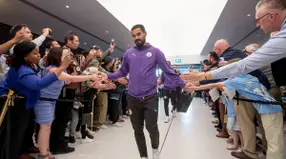 Watch the first team arrive as they walk through the Tunnel Club
