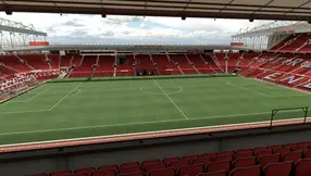 Sir Alex Ferguson Stand padded seating on or near the halfway line