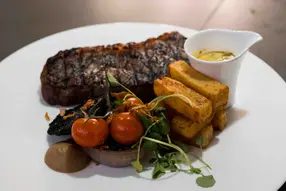 Three-course menu served pre-main act: Delight in a three-course menu, offering a perfect blend of elegance and convenience, crafted to enhance your experience